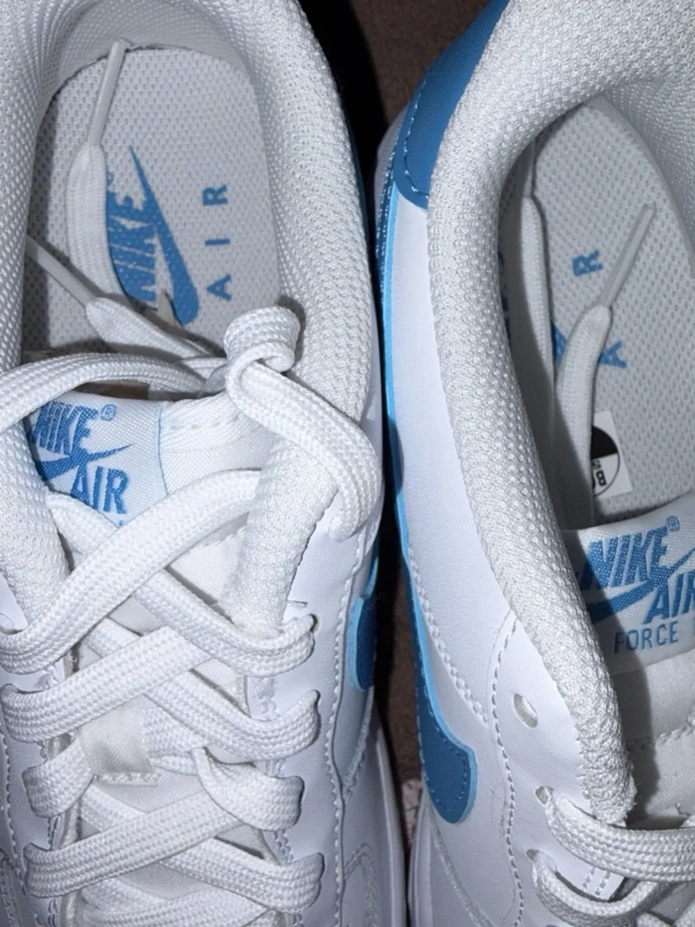 Nike White Sneakers with Blue Swoosh